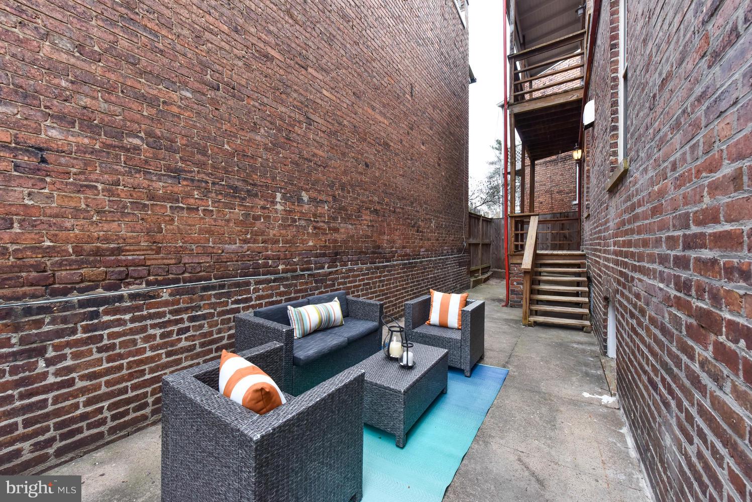 110 13th Street Southeast Washington, DC 20003 - Photo 38 of 58 Deep side patio runs length of house