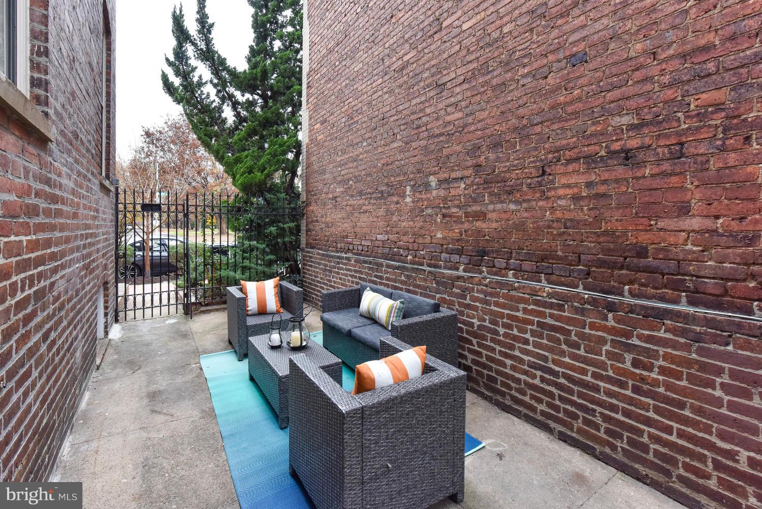 110 13th Street Southeast Washington, DC 20003 - Photo 39 of 58 Gated side patio looking toward Lincoln Park