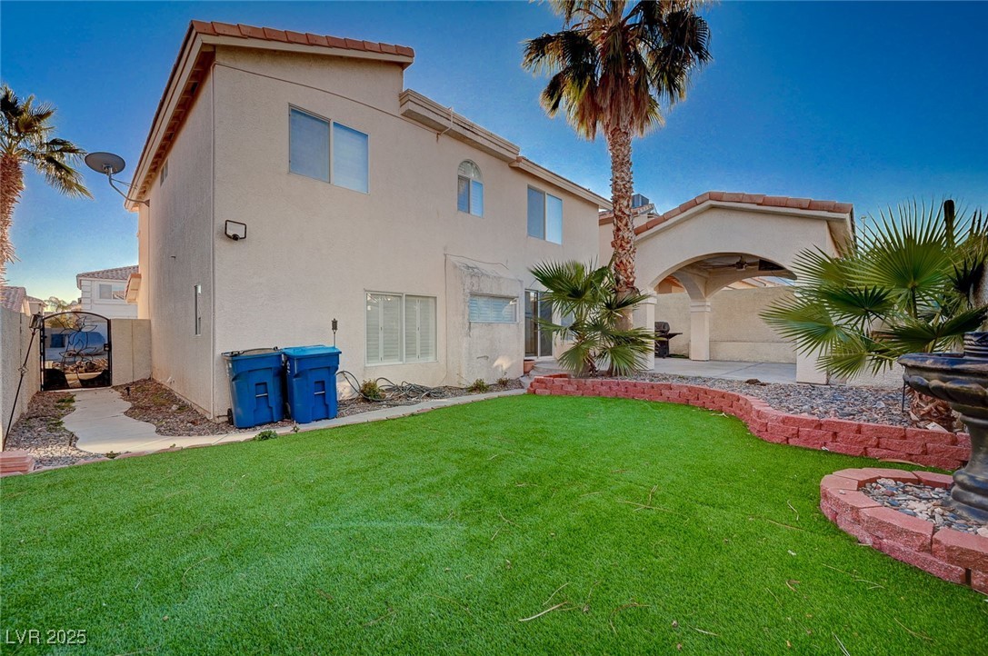 8776 Country View Avenue Las Vegas, NV 89129 - Photo 43 of 43 Back of property featuring stucco siding