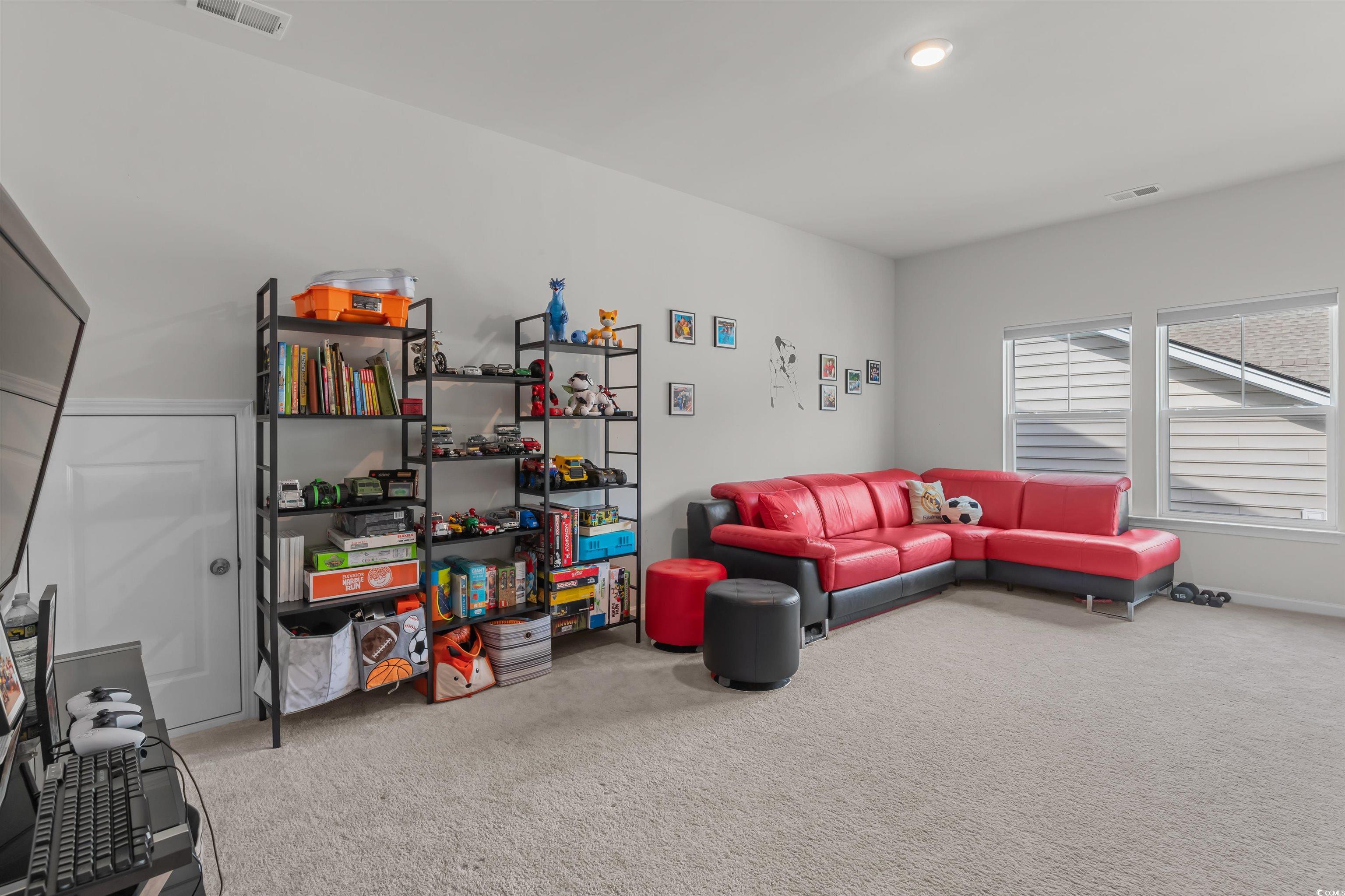 1176 HARBISON Circle Myrtle Beach, SC 29579 - Photo 31 of 40 Carpeted living area with visible vents