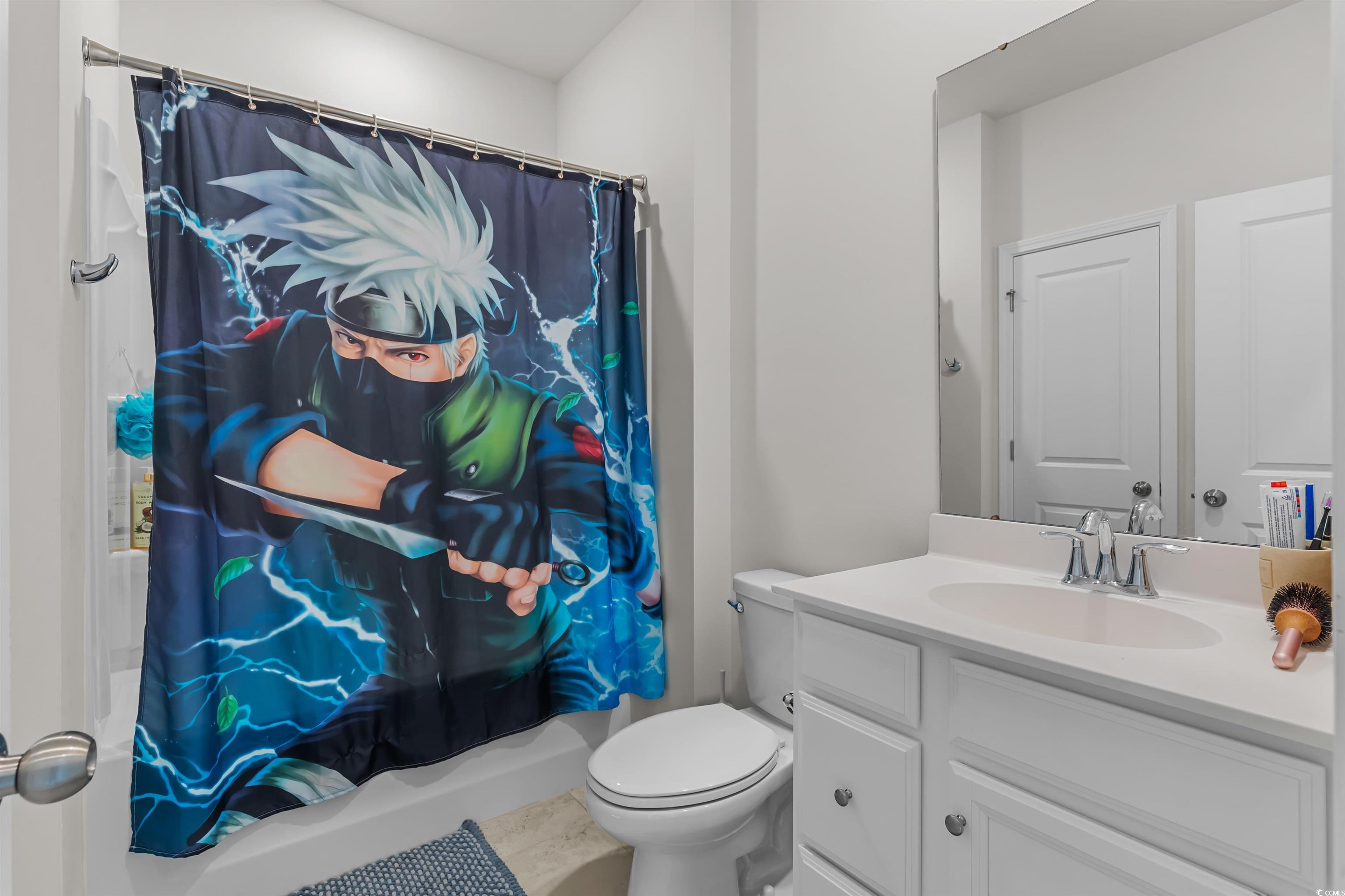 1176 HARBISON Circle Myrtle Beach, SC 29579 - Photo 32 of 40 Full bathroom featuring toilet, shower / bath combo with shower curtain, and vanity