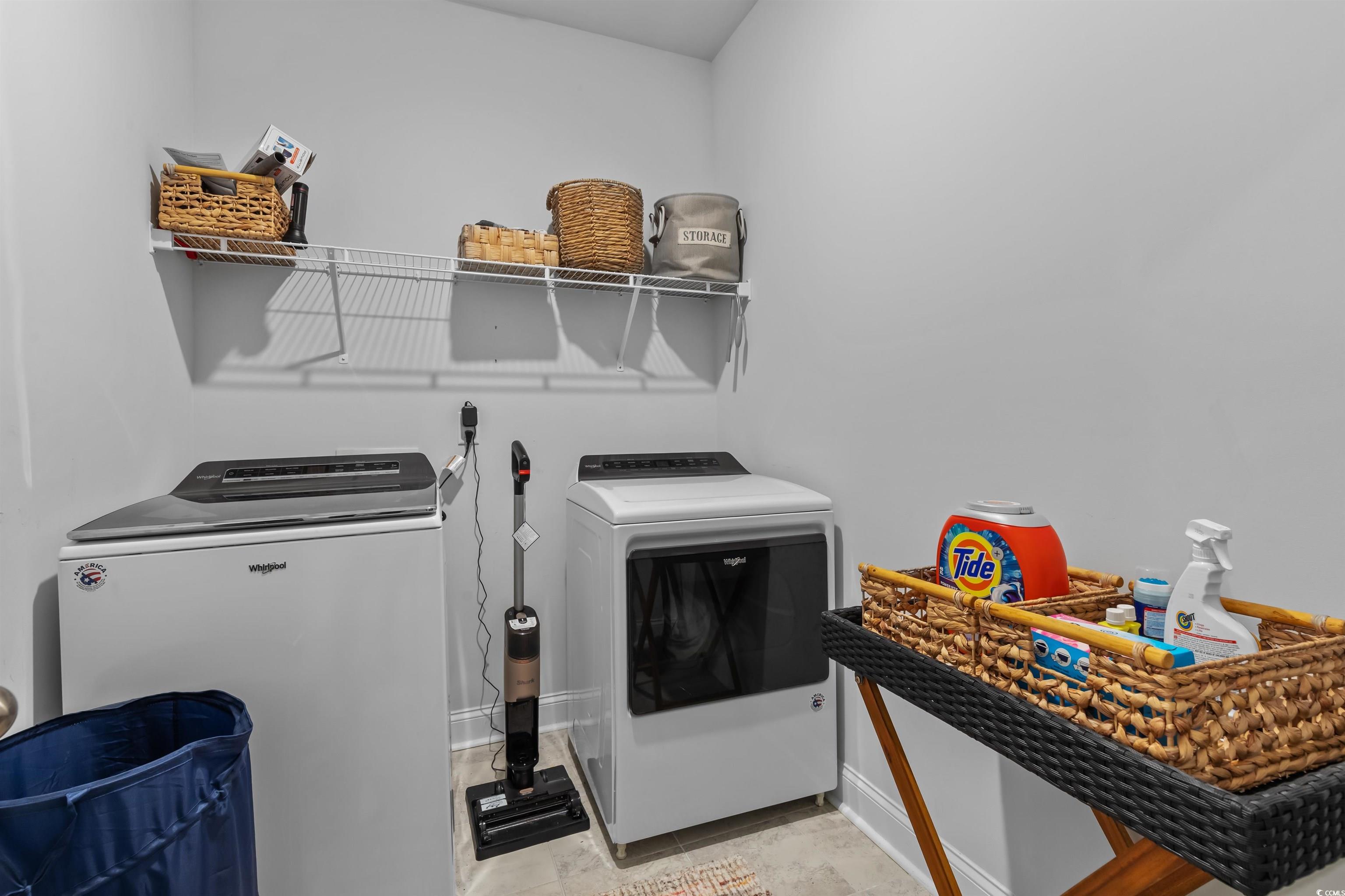 1176 HARBISON Circle Myrtle Beach, SC 29579 - Photo 9 of 40 Laundry area with baseboards, washing machine and clothes dryer, and laundry area