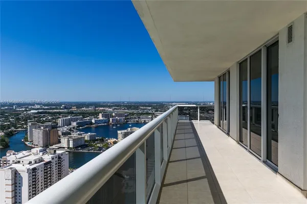 a view of balcony with city