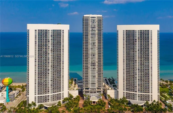 a view of a city with tall buildings