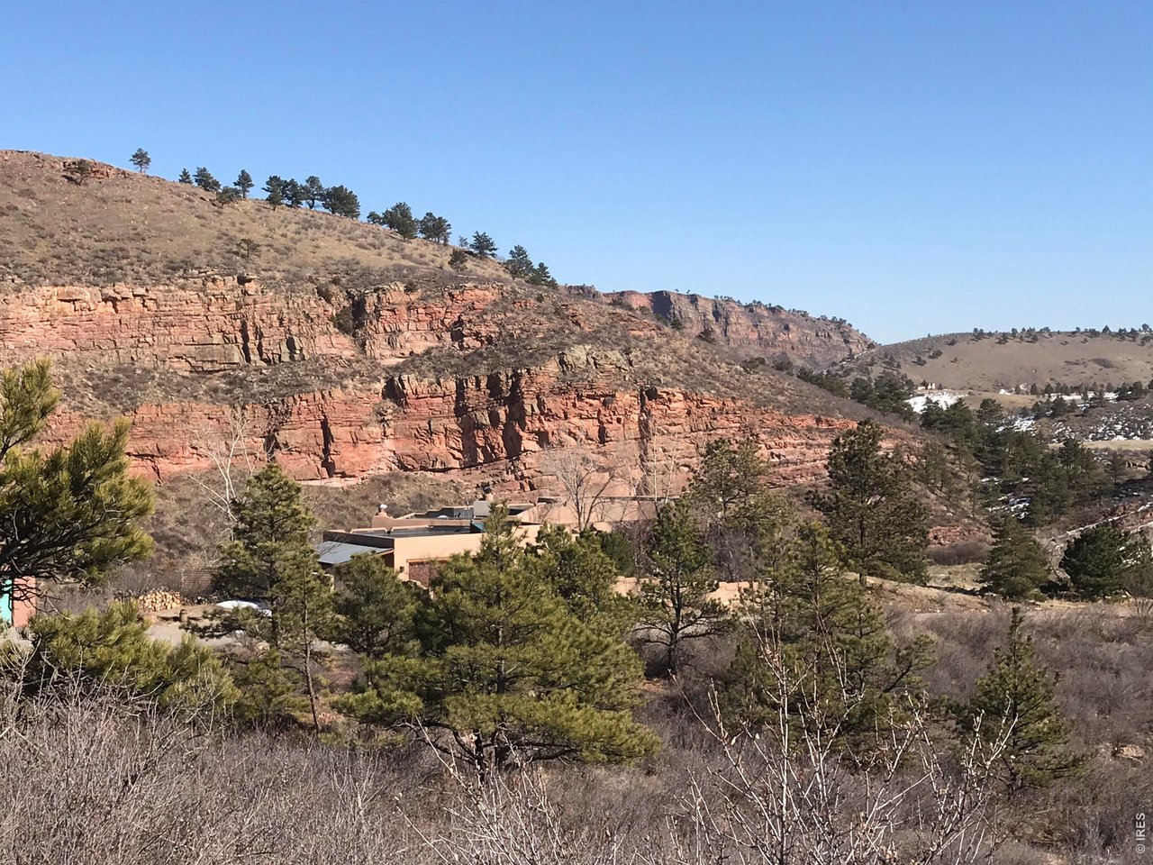 1115 Vision Way Lyons, CO 80540 - Photo 3 of 19 an aerial view of mountain with trees around
