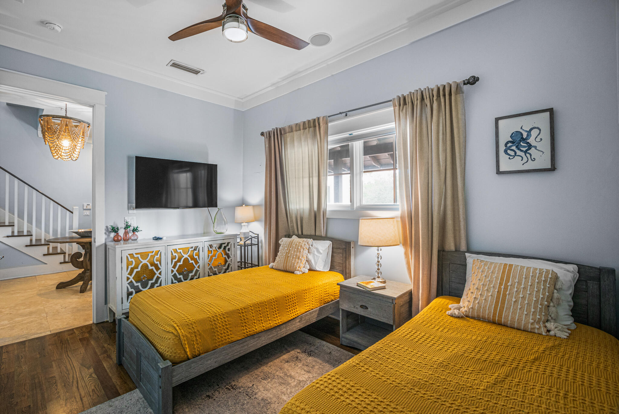 5231 East County Highway 30A, Unit D Santa Rosa Beach, FL 32459 - Photo 4 of 42 a bedroom with a bed and a flat screen tv