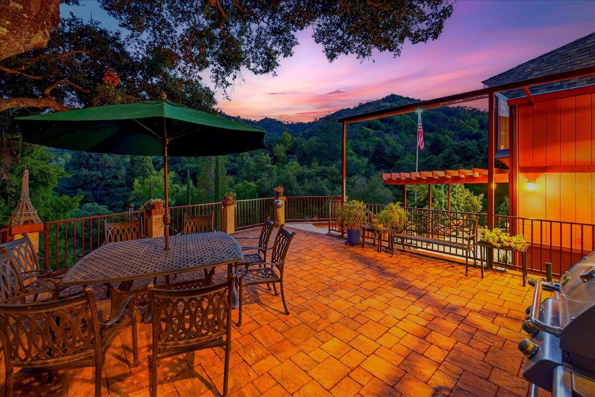 5224 Twin Falls Road Morgan Hill, CA 95037 - Photo 13 of 111 a view of a patio with a table chairs and a backyard