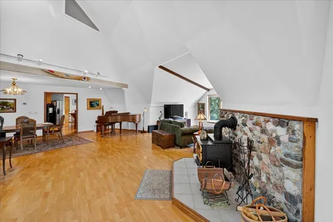 a living room with furniture and a rug