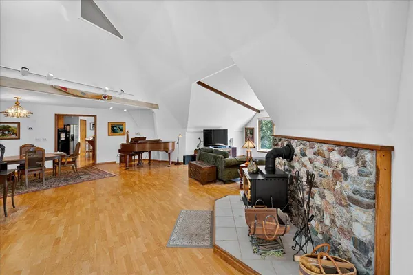 a living room with furniture and a rug