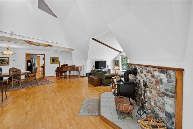 a living room with furniture and a rug