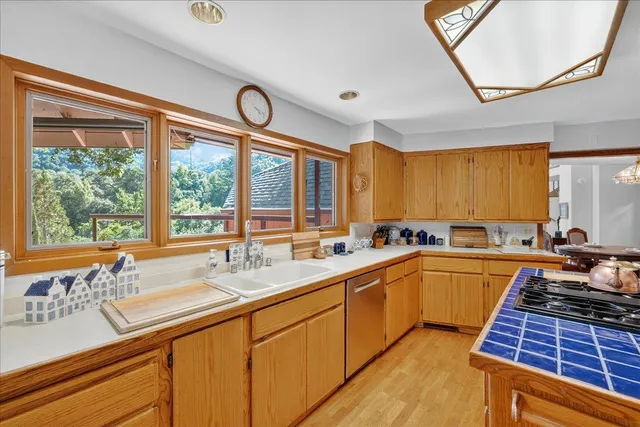 a bathroom with a bathtub sink and mirror