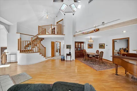 an aerial view of a houses with yard