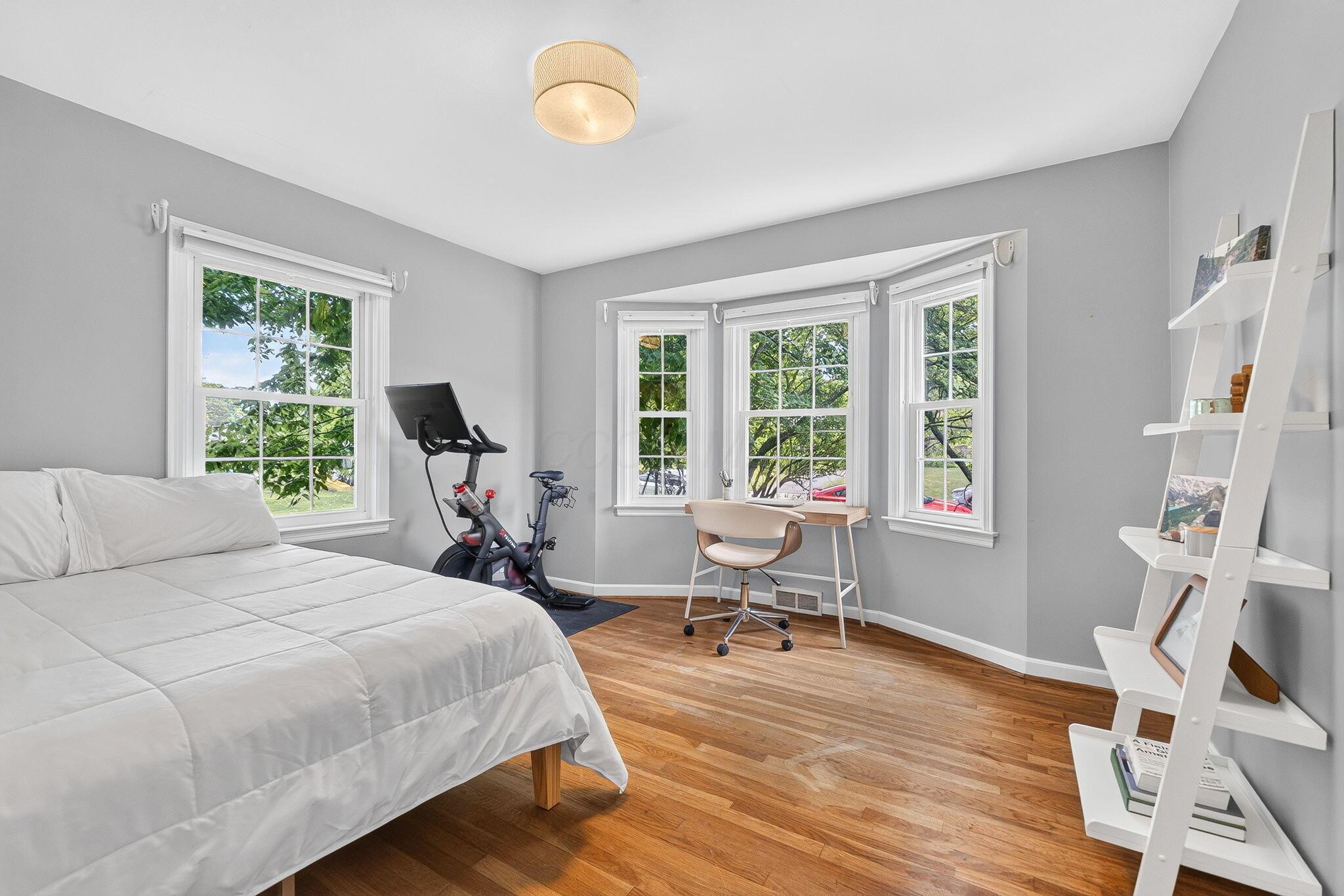 492 Wetmore Road Columbus, OH 43214 - Photo 29 of 55 Hardwood flooring paired with light gray walls