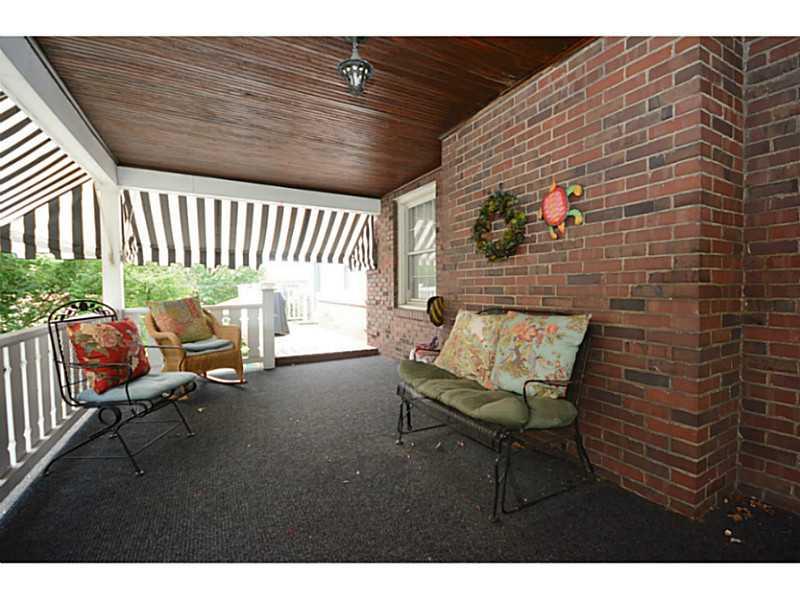 1256 Prospect Road Whitehall, PA 15227 - Photo 14 of 25 Patio/Deck. Spacious Side Porch with Custom Awnings