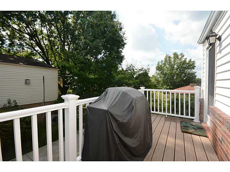 1256 Prospect Road Whitehall, PA 15227 - Photo 16 of 25 Patio/Deck. Composite Deck with Solar Lighting off of Family Room and Connecting to Side Porch