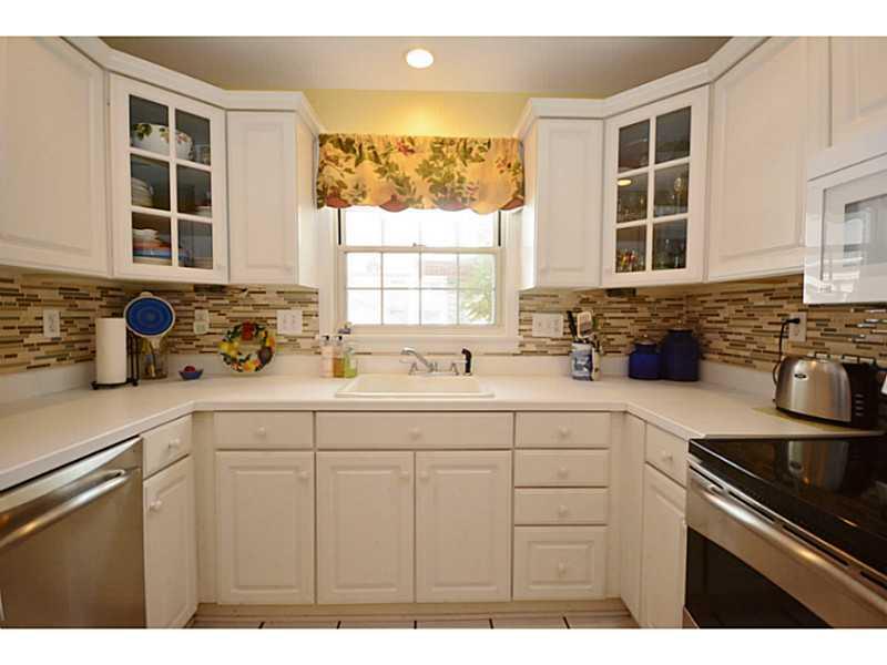 1256 Prospect Road Whitehall, PA 15227 - Photo 9 of 25 Kitchen. Glass-tiled Backsplash