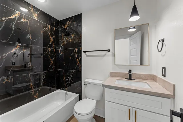 a view of room with window and hardwood floor