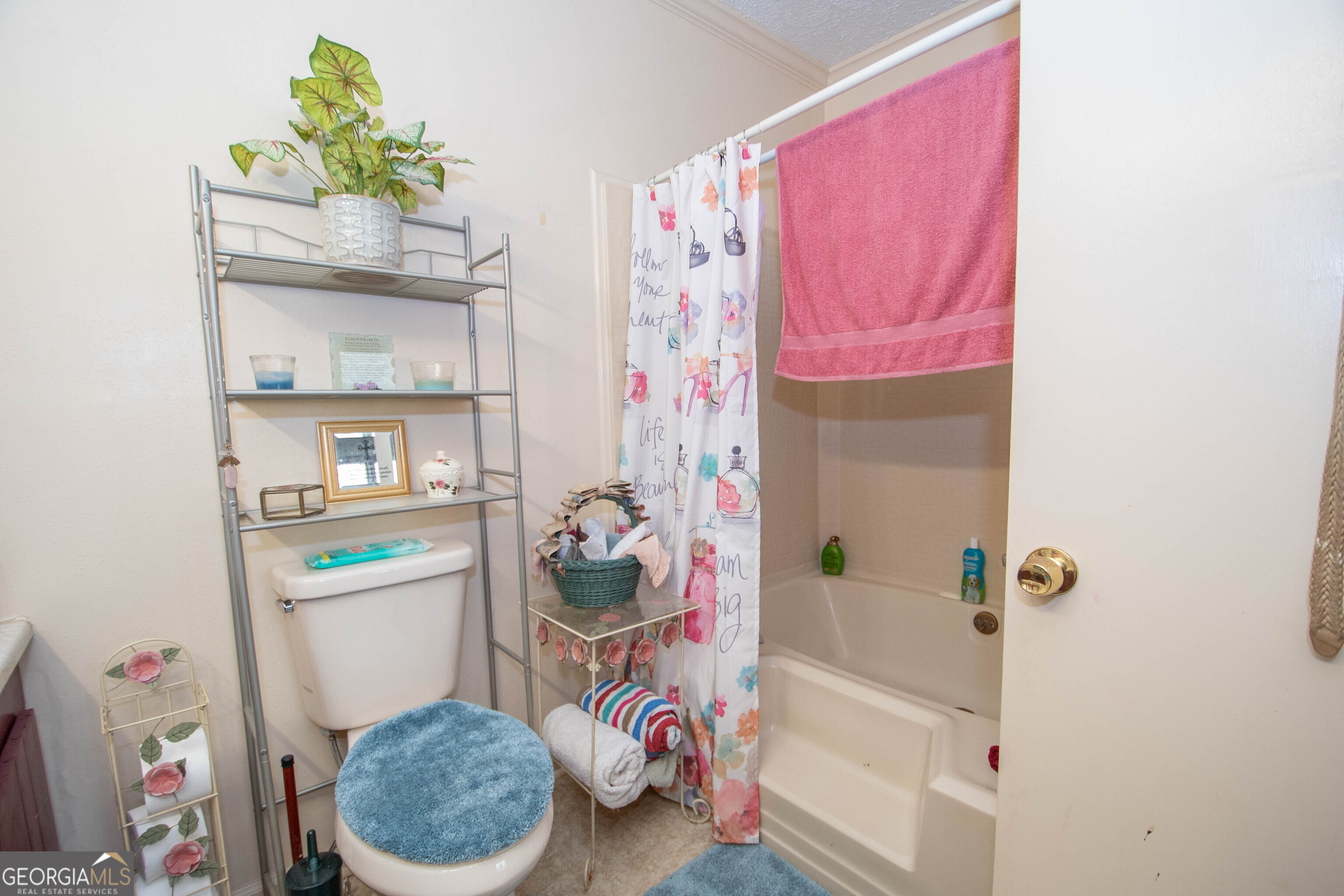 125 Fowler Street Warm Springs, GA 31830 - Photo 29 of 46 a bathroom with a sink toilet and shower