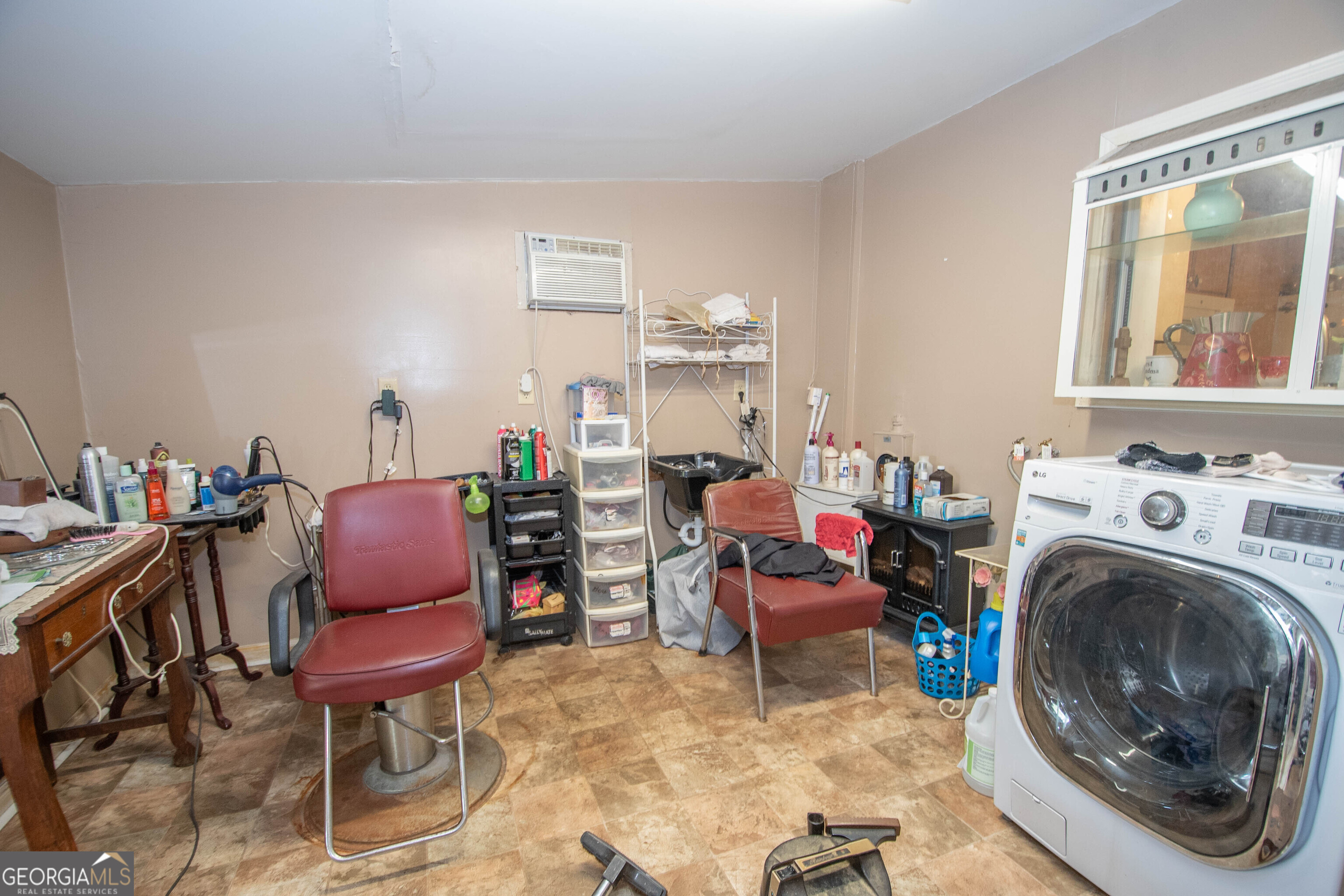 125 Fowler Street Warm Springs, GA 31830 - Photo 30 of 46 a living room with furniture a window and a fireplace