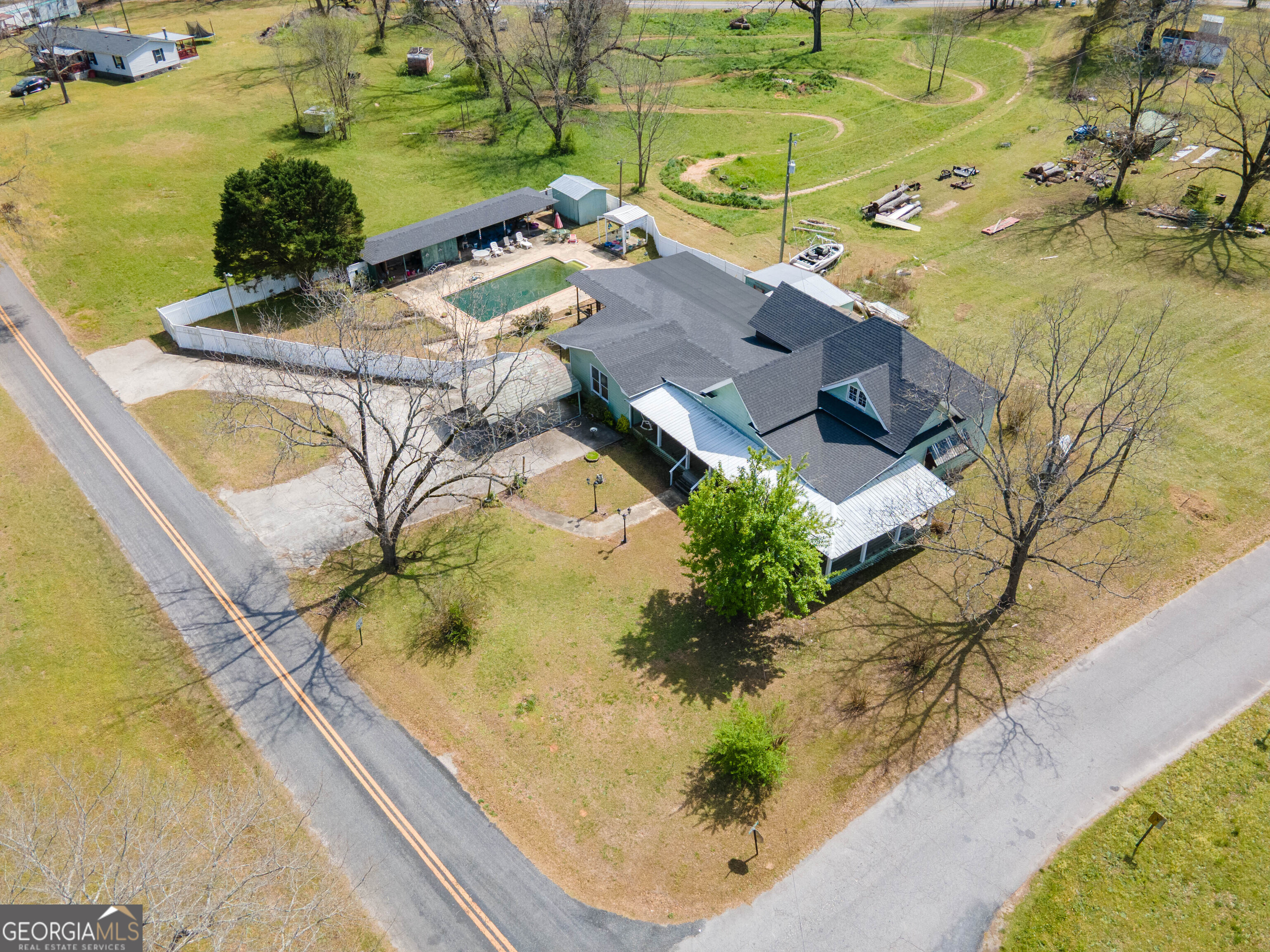 125 Fowler Street Warm Springs, GA 31830 - Photo 3 of 46 an aerial view of a house with a yard swimming pool and outdoor seating