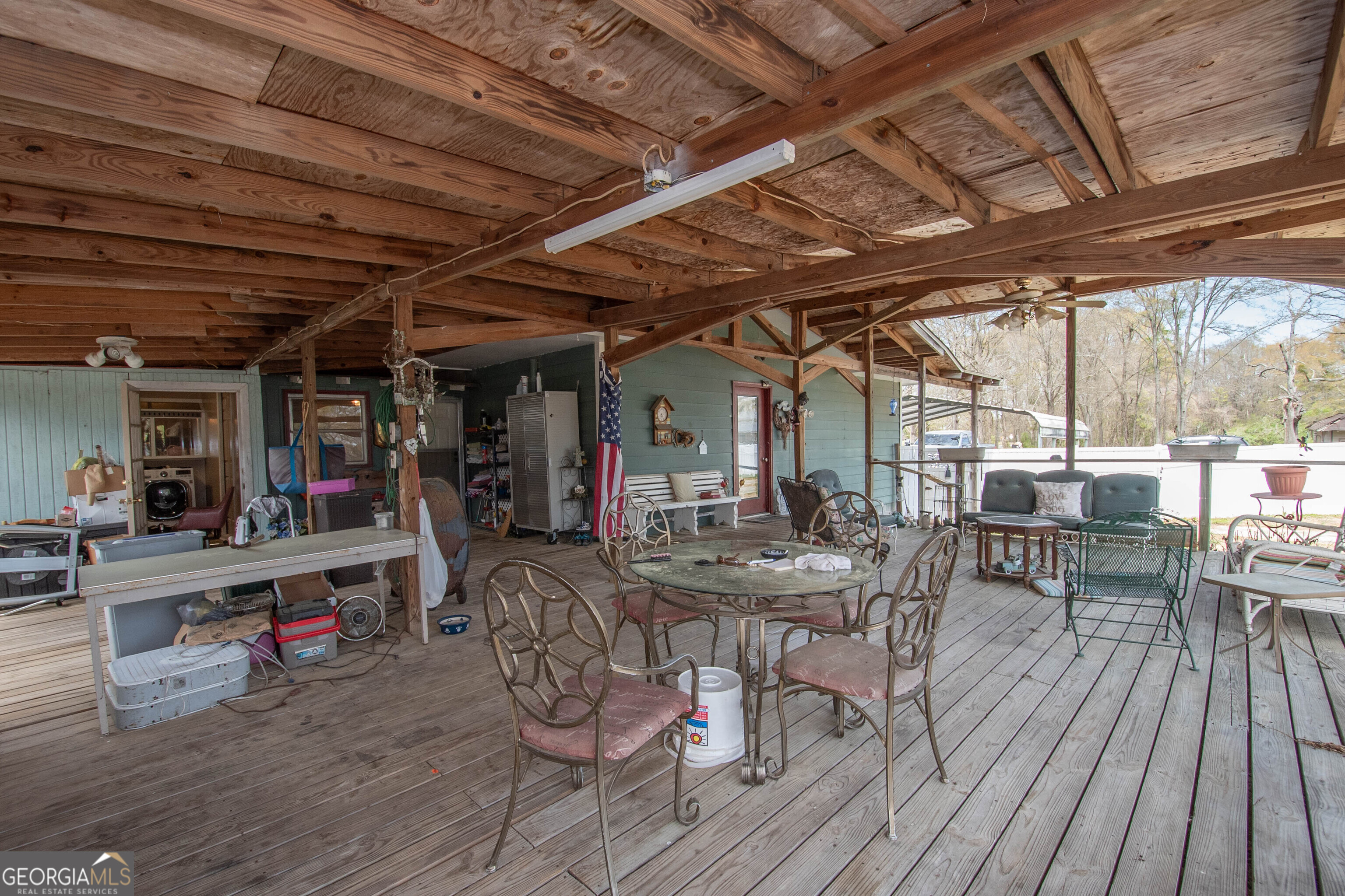 125 Fowler Street Warm Springs, GA 31830 - Photo 33 of 46 a view of a chairs and tables in patio