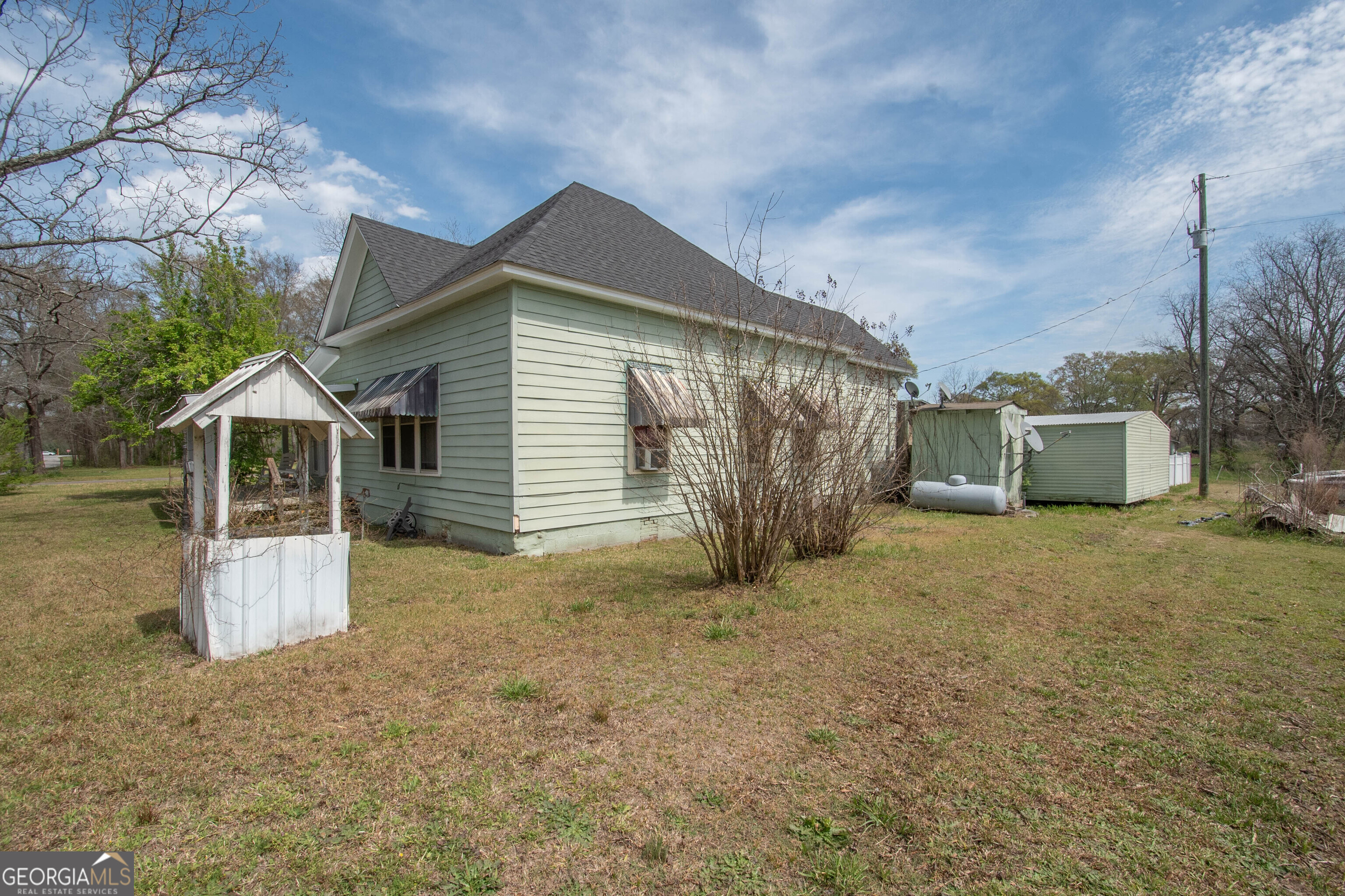125 Fowler Street Warm Springs, GA 31830 - Photo 43 of 46 a front view of a house with a yard