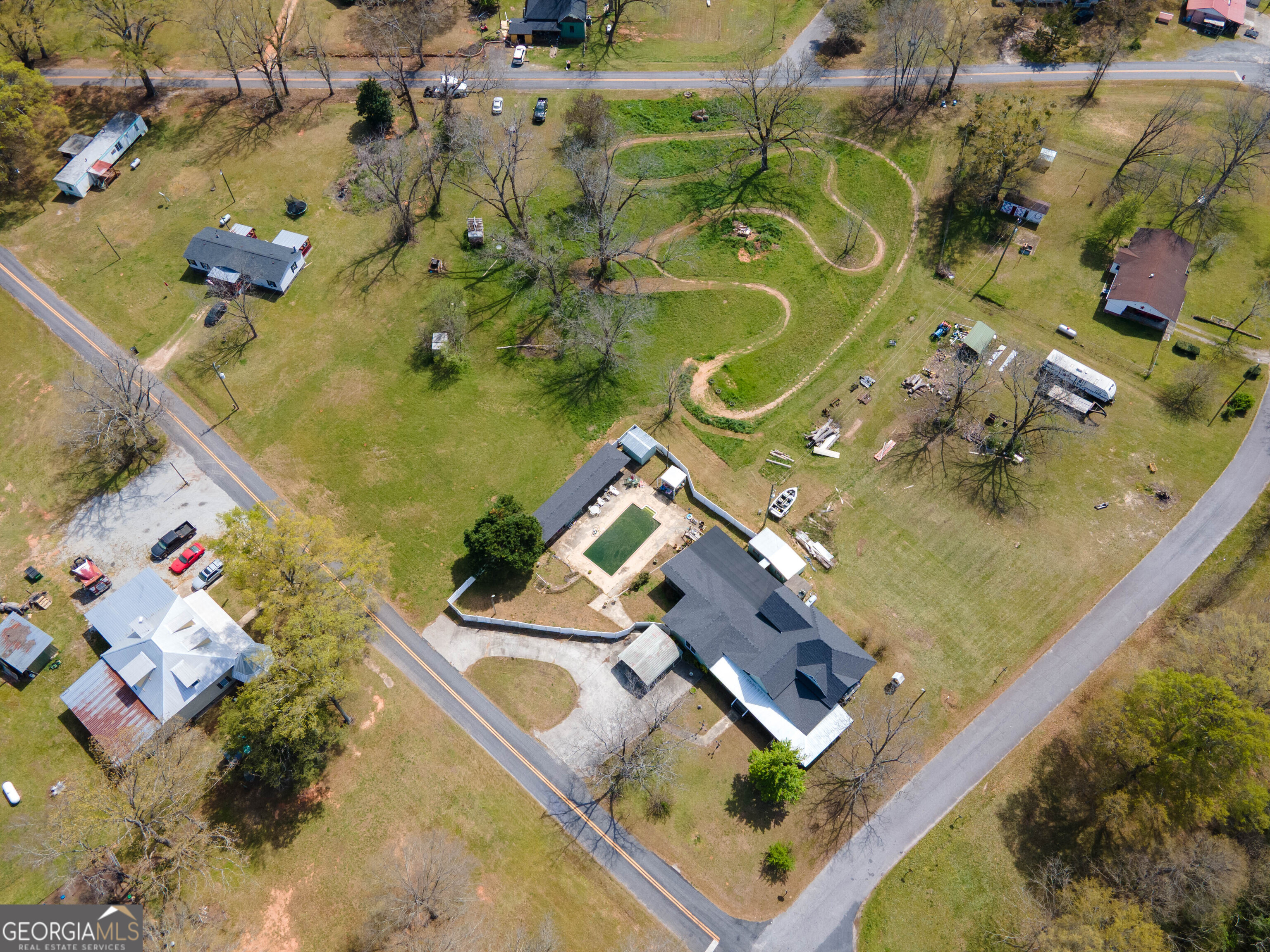 125 Fowler Street Warm Springs, GA 31830 - Photo 45 of 46 an aerial view of a house with a swimming pool