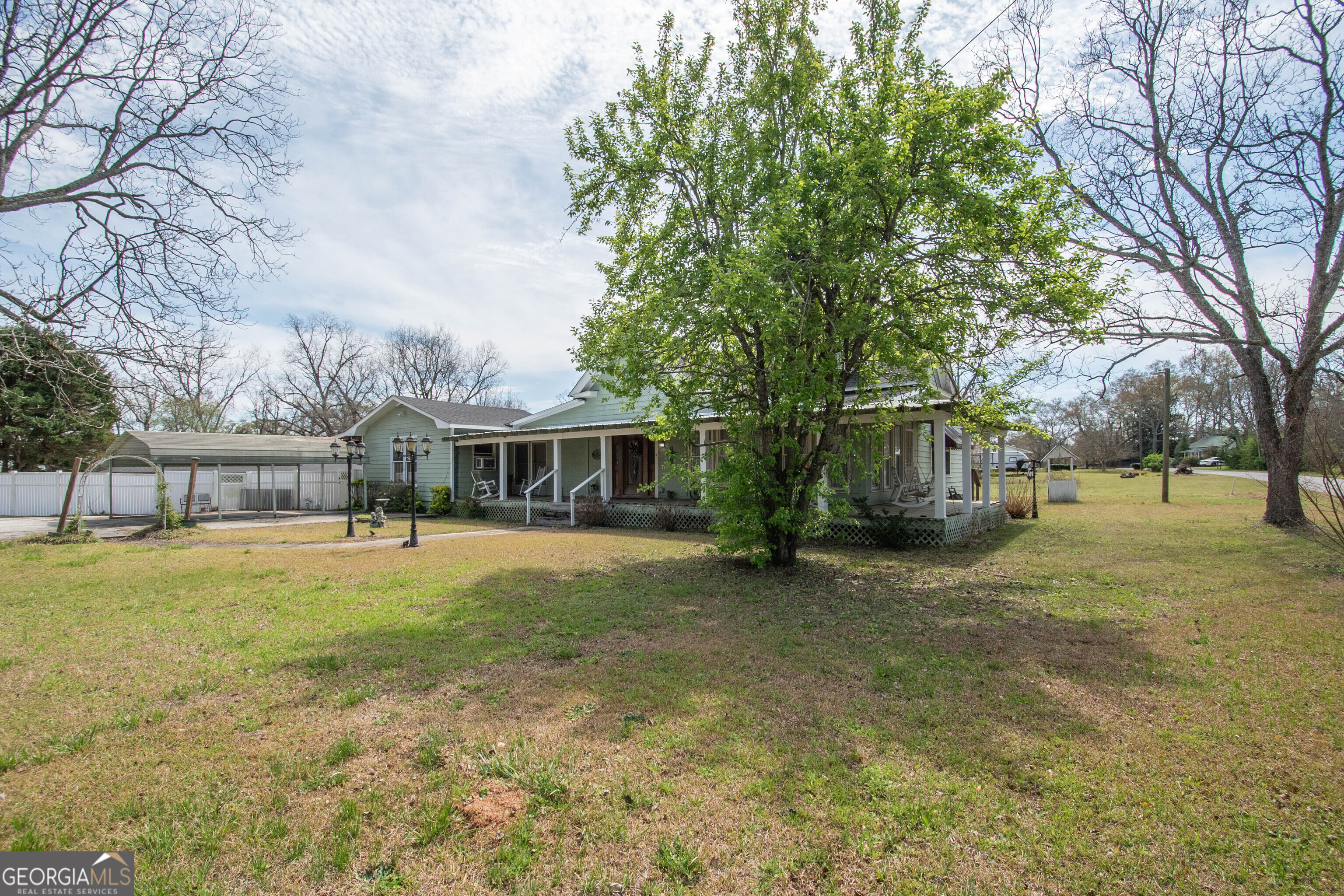 125 Fowler Street Warm Springs, GA 31830 - Photo 5 of 46 a front view of a house with a yard