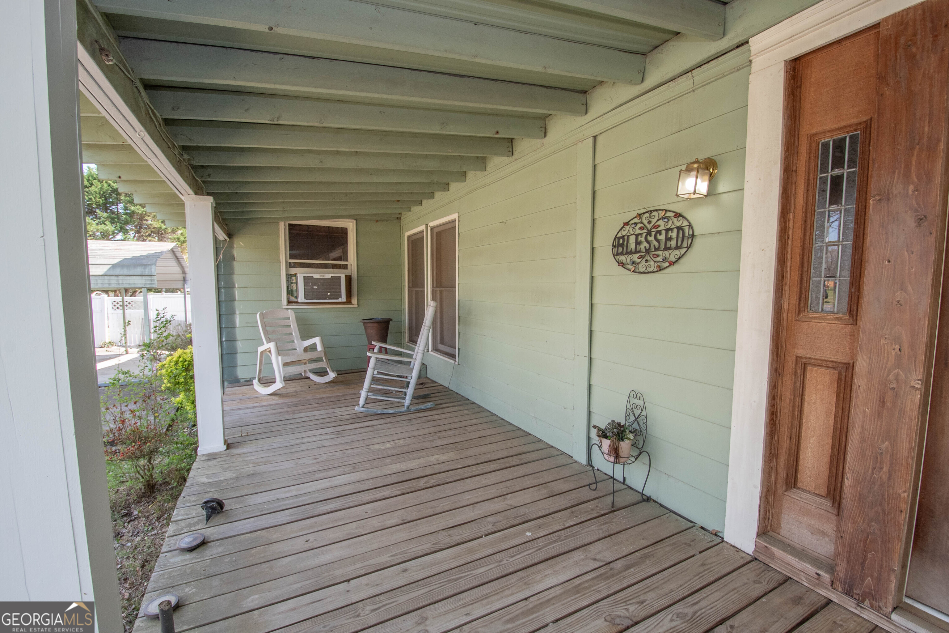 125 Fowler Street Warm Springs, GA 31830 - Photo 7 of 46 a house view with a outdoor seating space