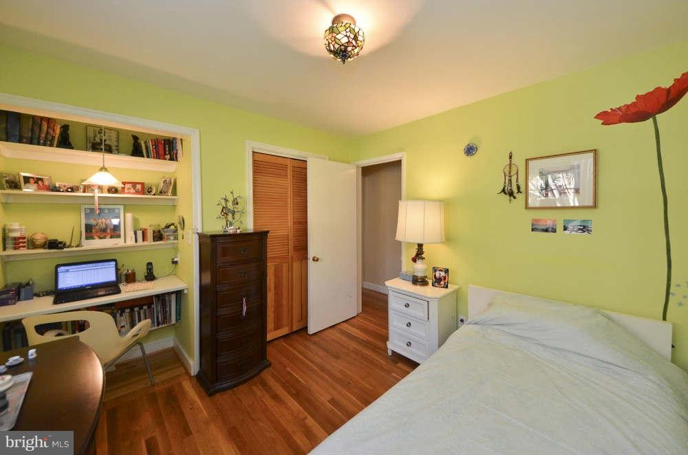 3020 Military Road Arlington, VA 22207 - Photo 12 of 26 a bedroom with a bed and a desk