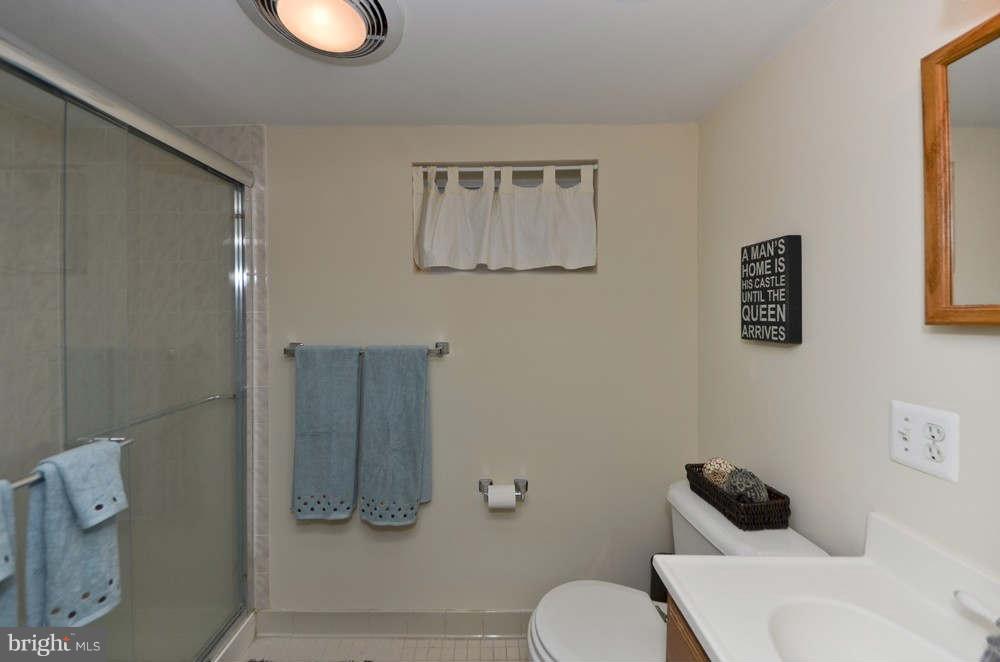 3020 Military Road Arlington, VA 22207 - Photo 17 of 26 a bathroom with a toilet and a shower