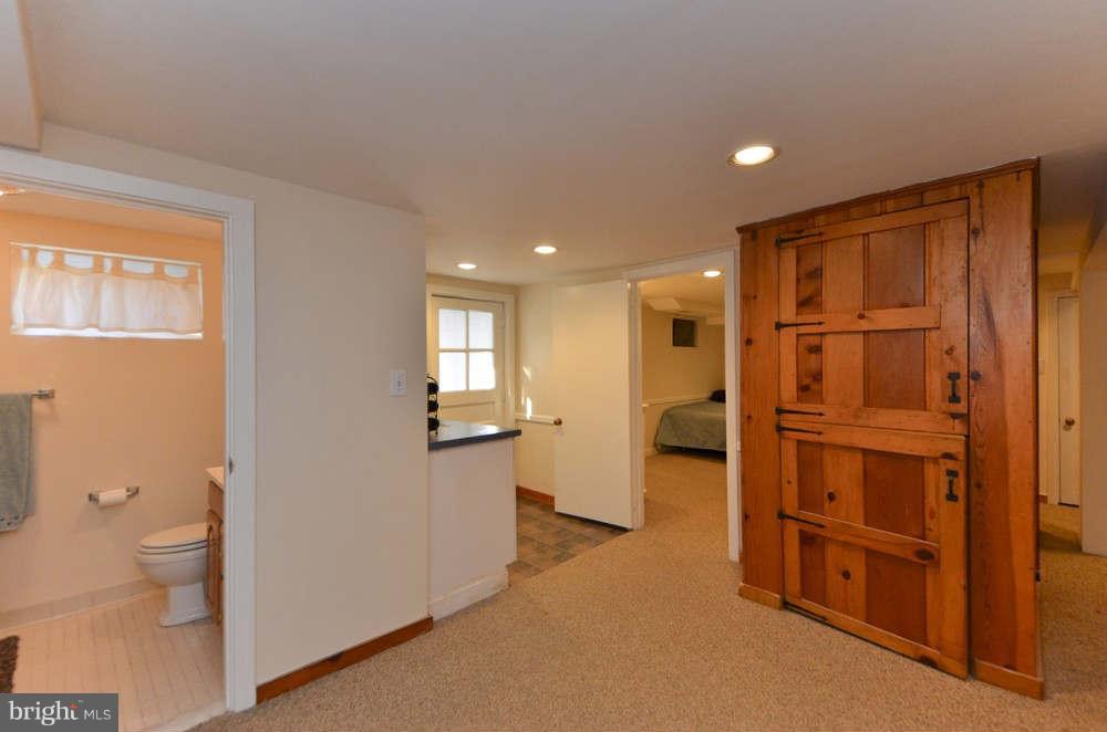 3020 Military Road Arlington, VA 22207 - Photo 20 of 26 a view of empty room with wooden floor and bathroom