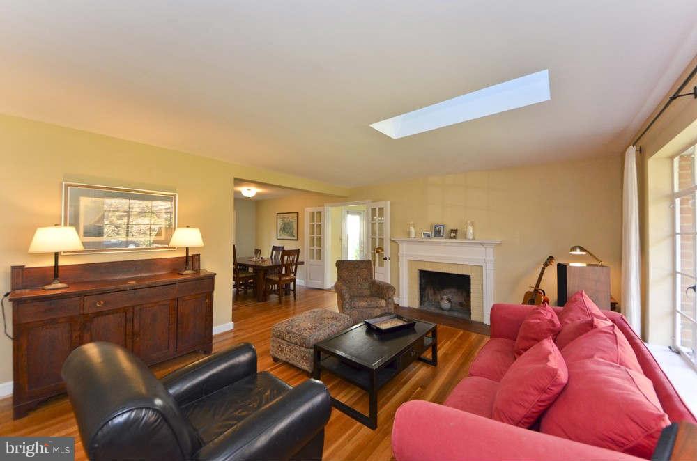 3020 Military Road Arlington, VA 22207 - Photo 3 of 26 a living room with furniture fireplace and dining table