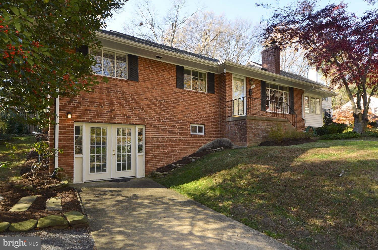 3020 Military Road Arlington, VA 22207 - Photo 26 of 26 a front view of a house with a yard