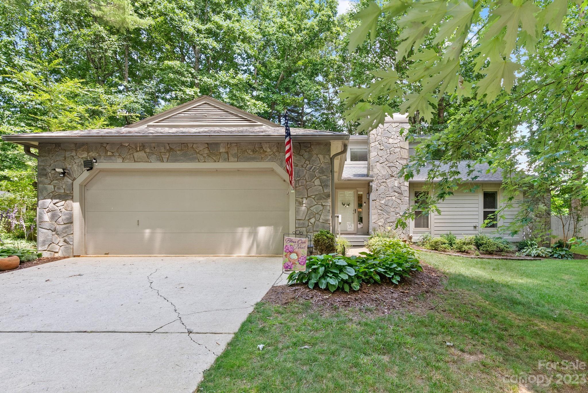 6 Holly Ridge Court Arden, NC 28704 - Photo 1 of 27 a front view of a house with a yard