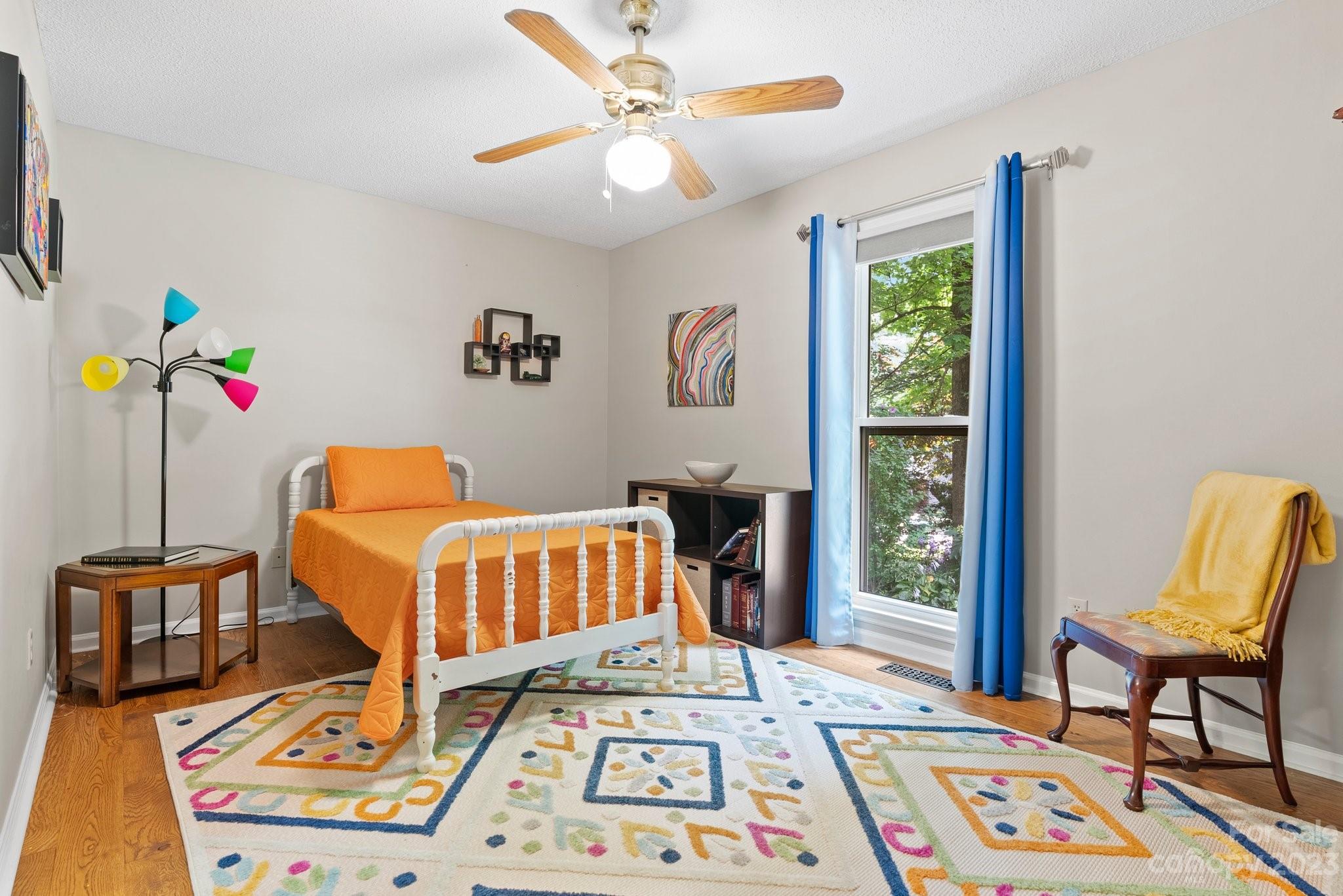 6 Holly Ridge Court Arden, NC 28704 - Photo 16 of 27 a bedroom with furniture and a window