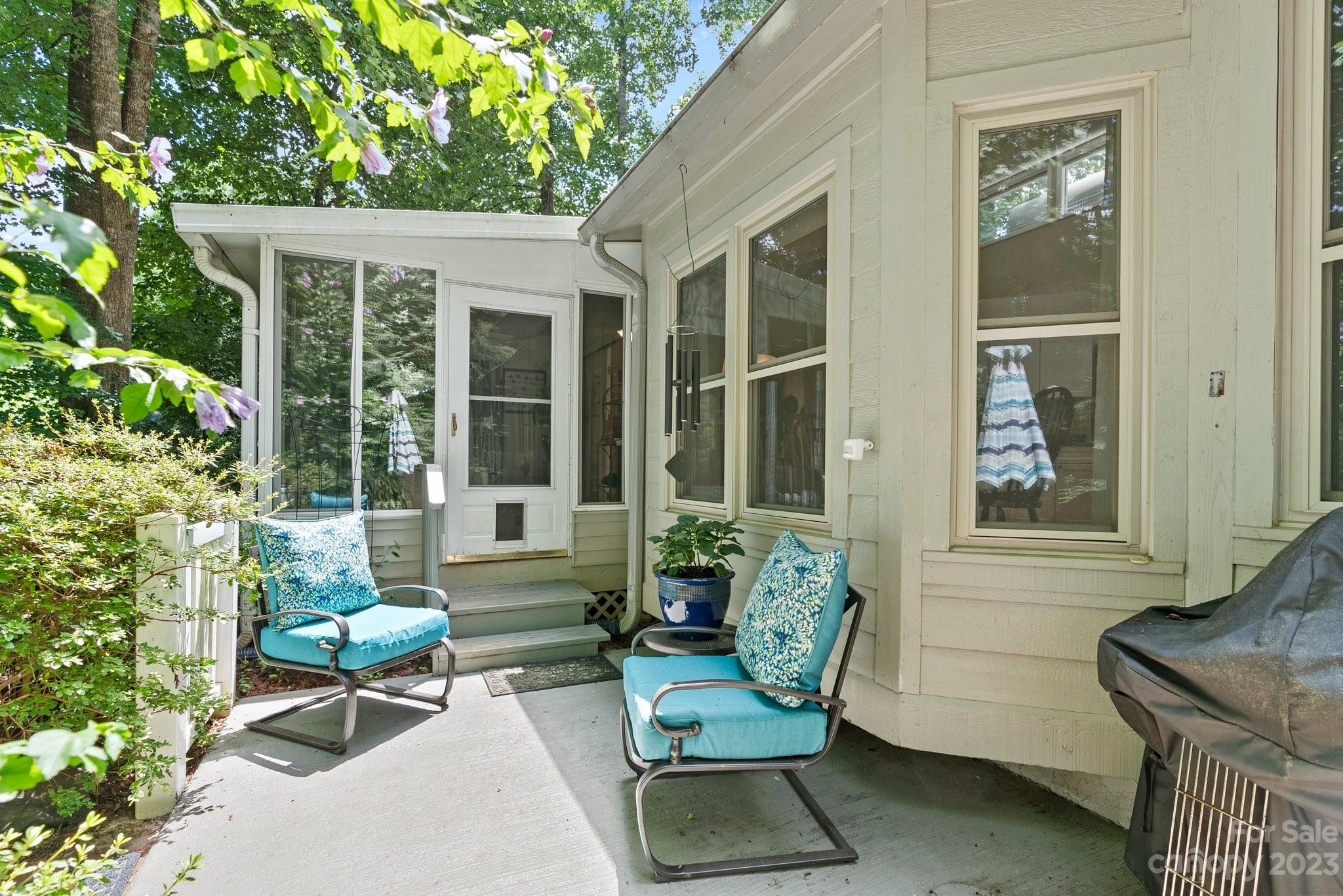 6 Holly Ridge Court Arden, NC 28704 - Photo 19 of 27 a building outdoor space with patio furniture