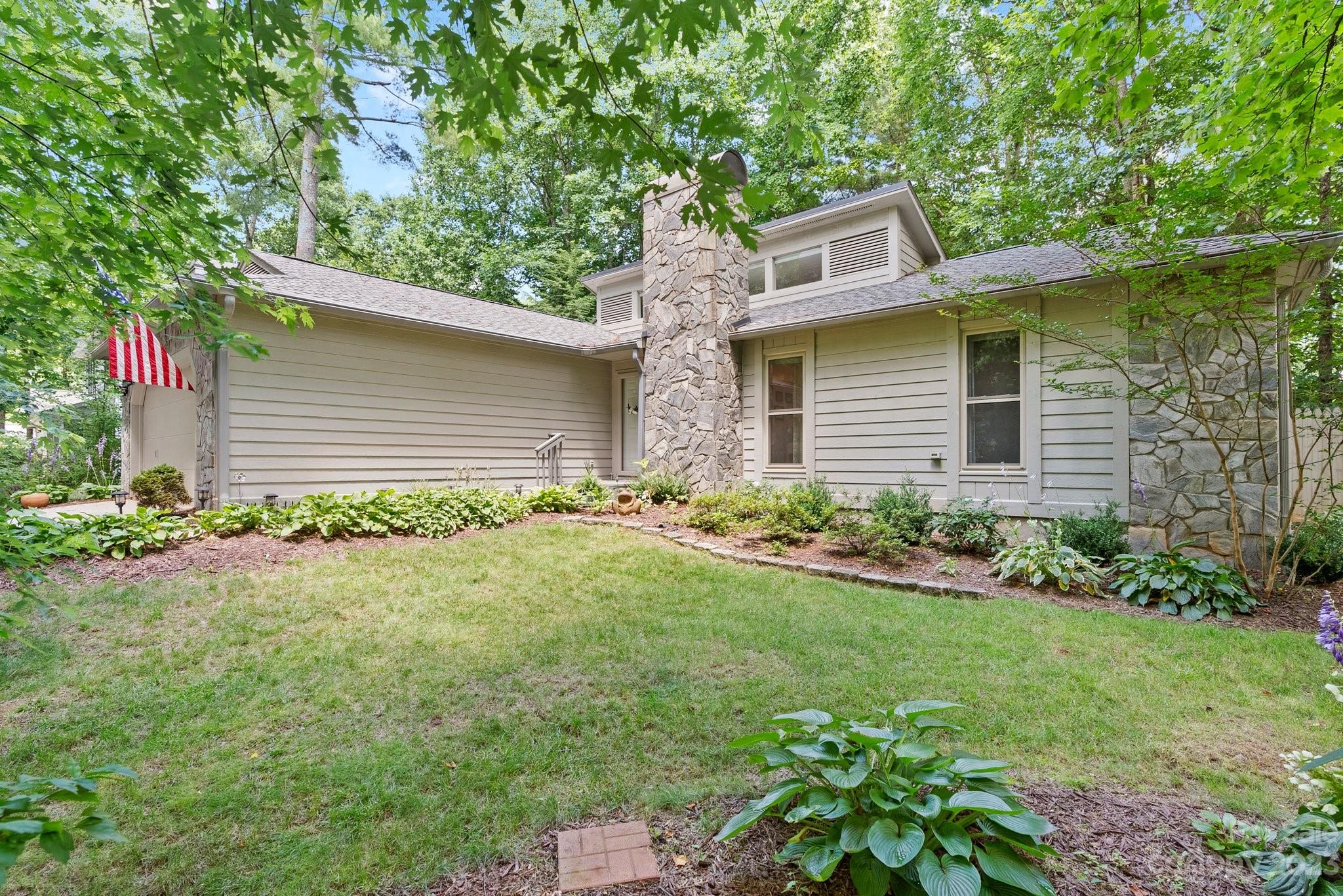 6 Holly Ridge Court Arden, NC 28704 - Photo 2 of 27 front view of house with a yard