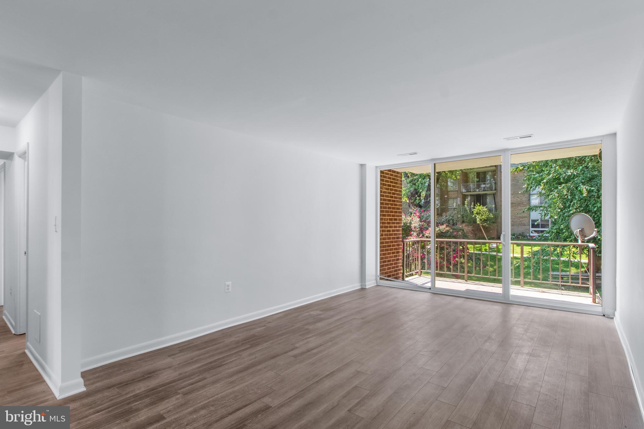 3934 Bel Pre Road, Unit 39343 Silver Spring, MD 20906 - Photo 4 of 30 Living Room 2
