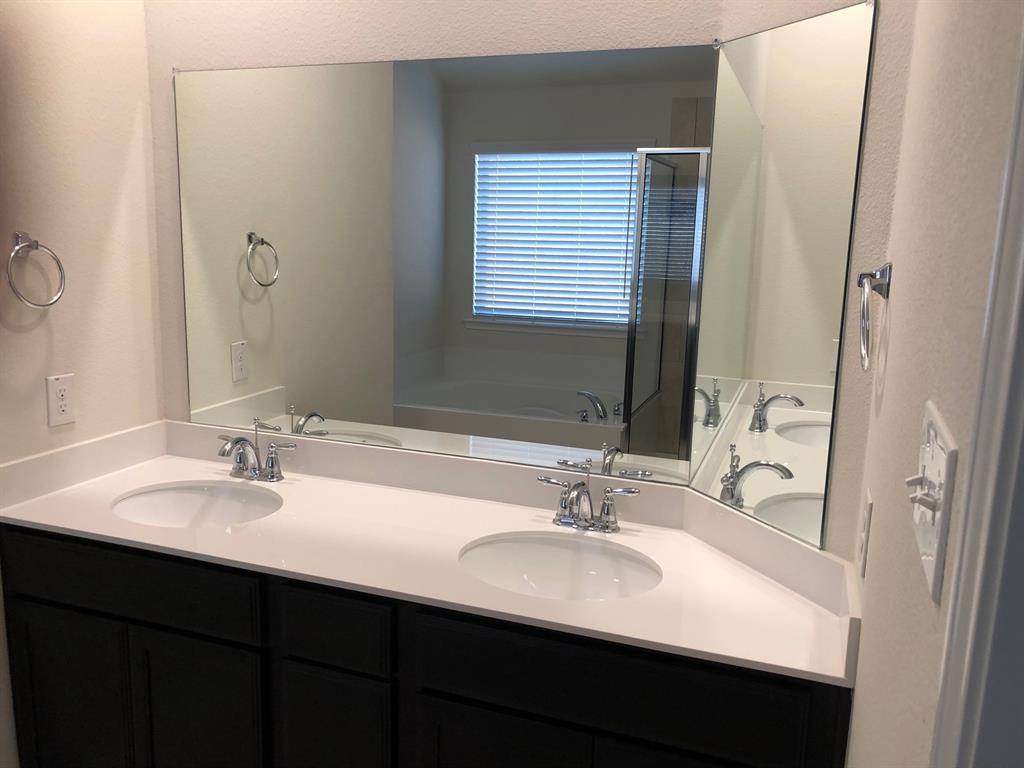 1732 Beasley Street Van Alstyne, TX 75495 - Photo 11 of 17 Full bath with double vanity, a bath, and a shower stall