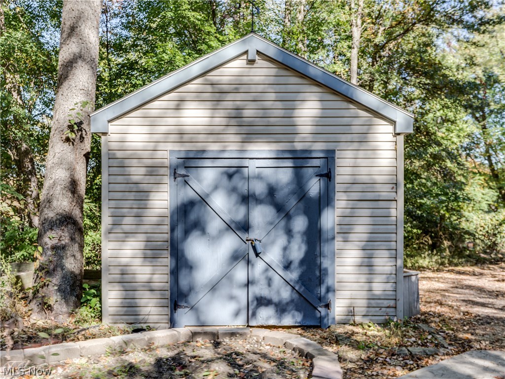 6644 Red Brush Road Ravenna, OH 44266 - Photo 7 of 35 The shed is handy for your yard equipment.