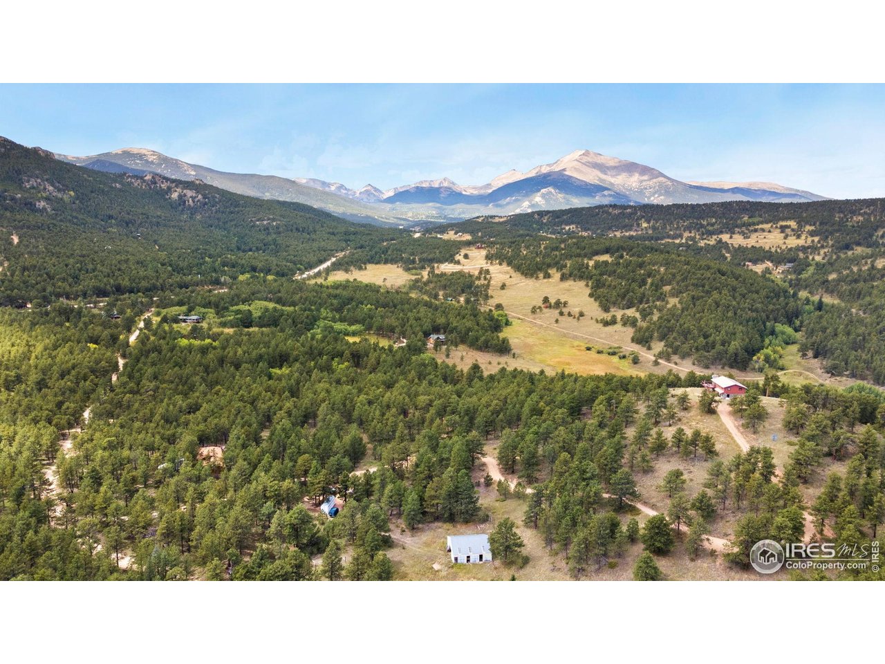 357 Big John Road Lyons, CO 80540 - Photo 5 of 14 a black and white photo of a mountain