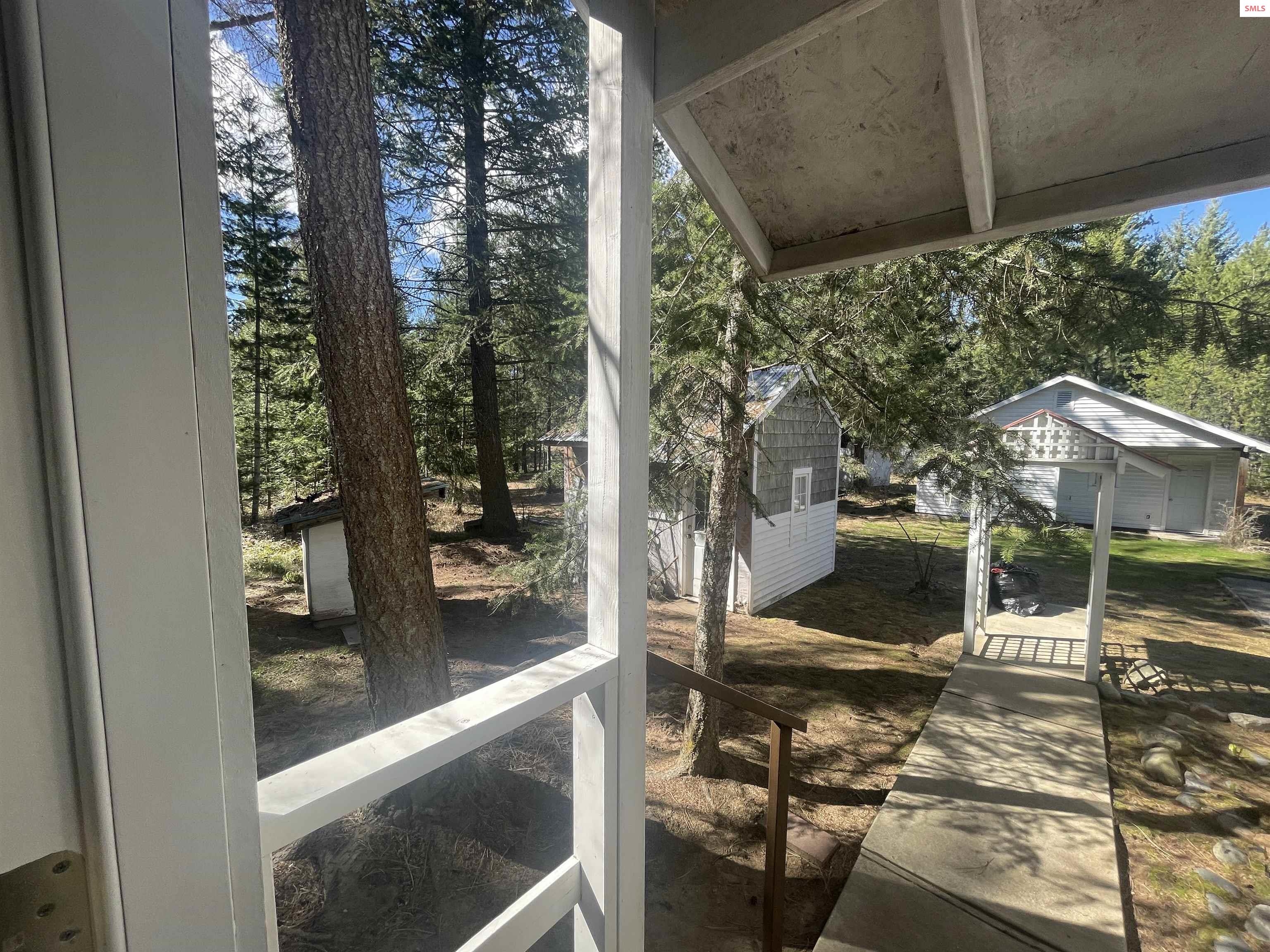 631 Wolverine Road Moyie Springs, ID 83845 - Photo 55 of 87 Mud Room Porch view of Arbor, Garden Shed, Garage