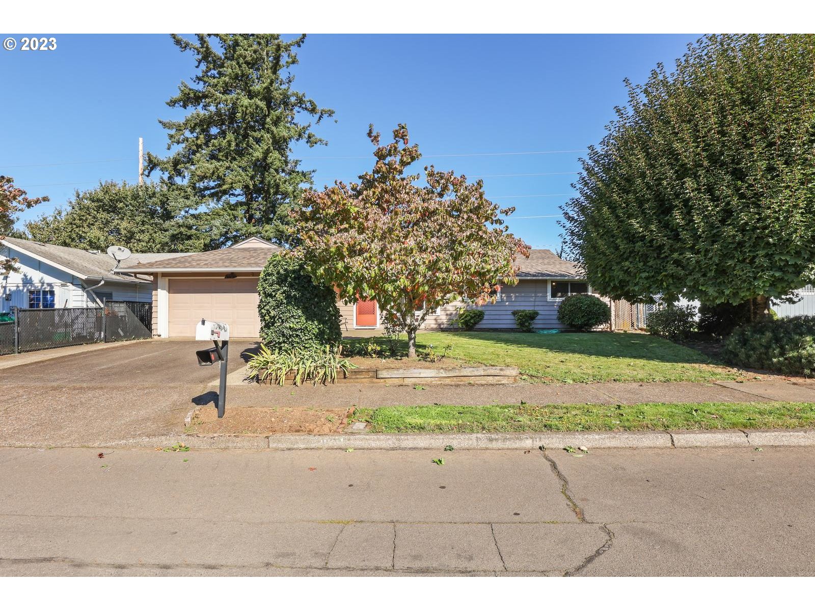23921 Southeast Oak Street Gresham, OR 97030 - Photo 13 of 46 a view of a house with a street