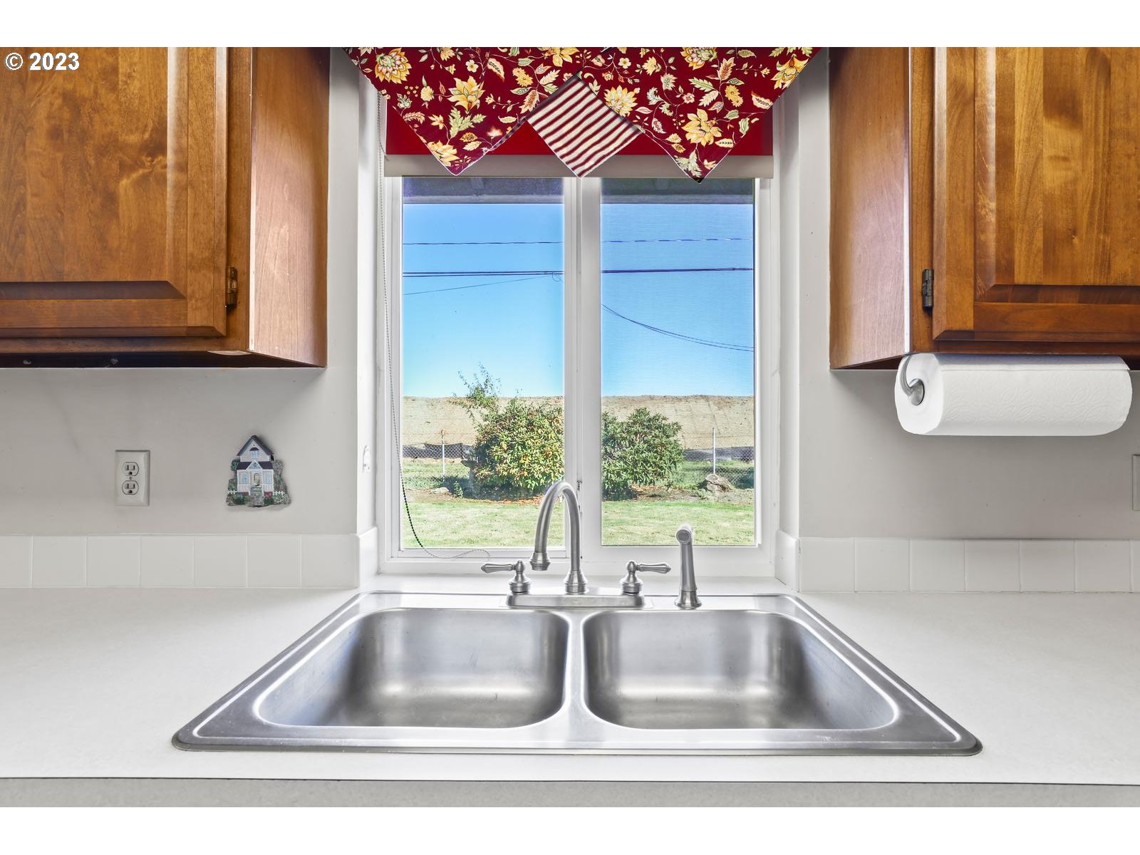 23921 Southeast Oak Street Gresham, OR 97030 - Photo 34 of 46 a kitchen with a sink and a window