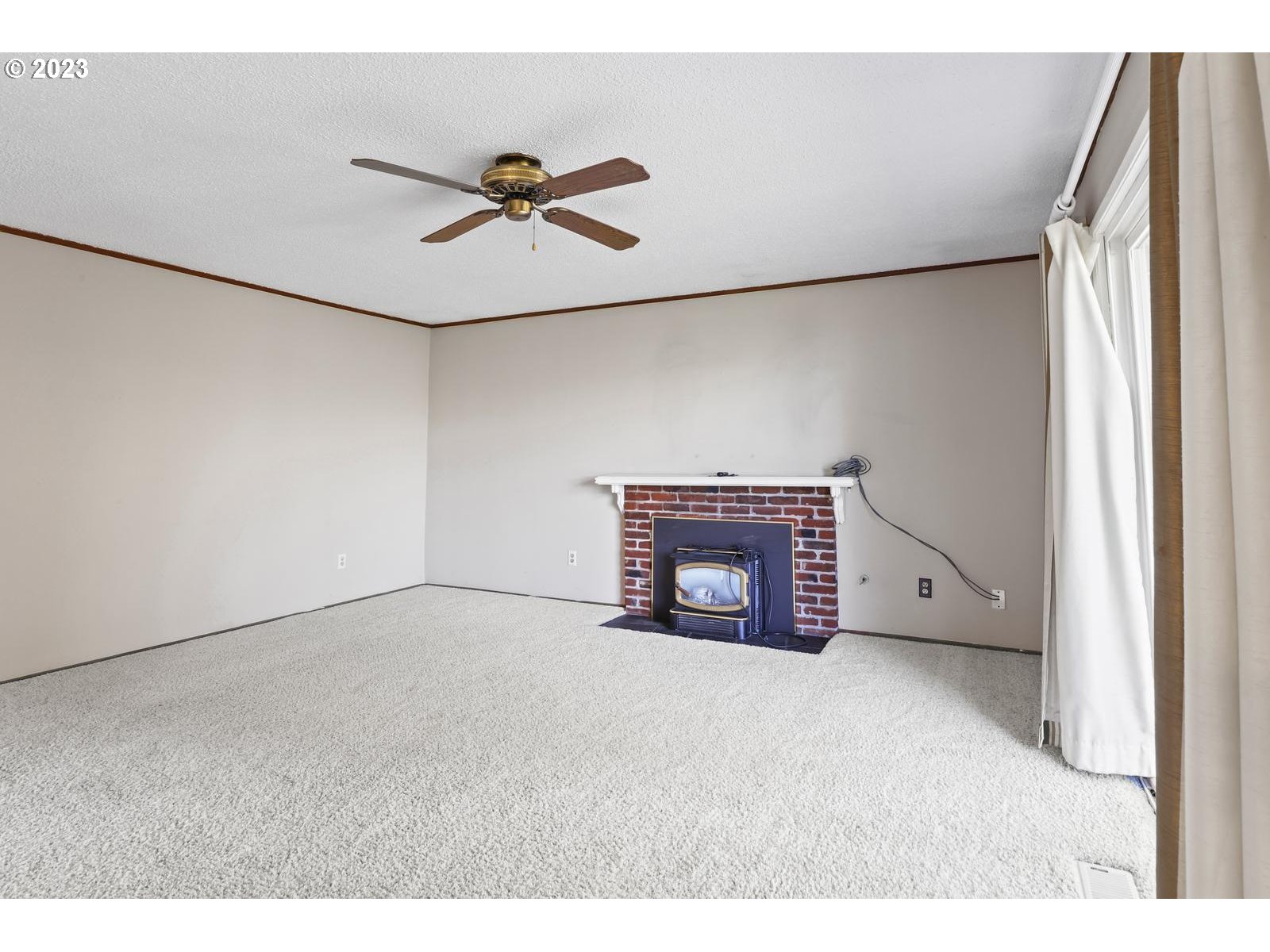 23921 Southeast Oak Street Gresham, OR 97030 - Photo 38 of 46 a view of an empty room with a window