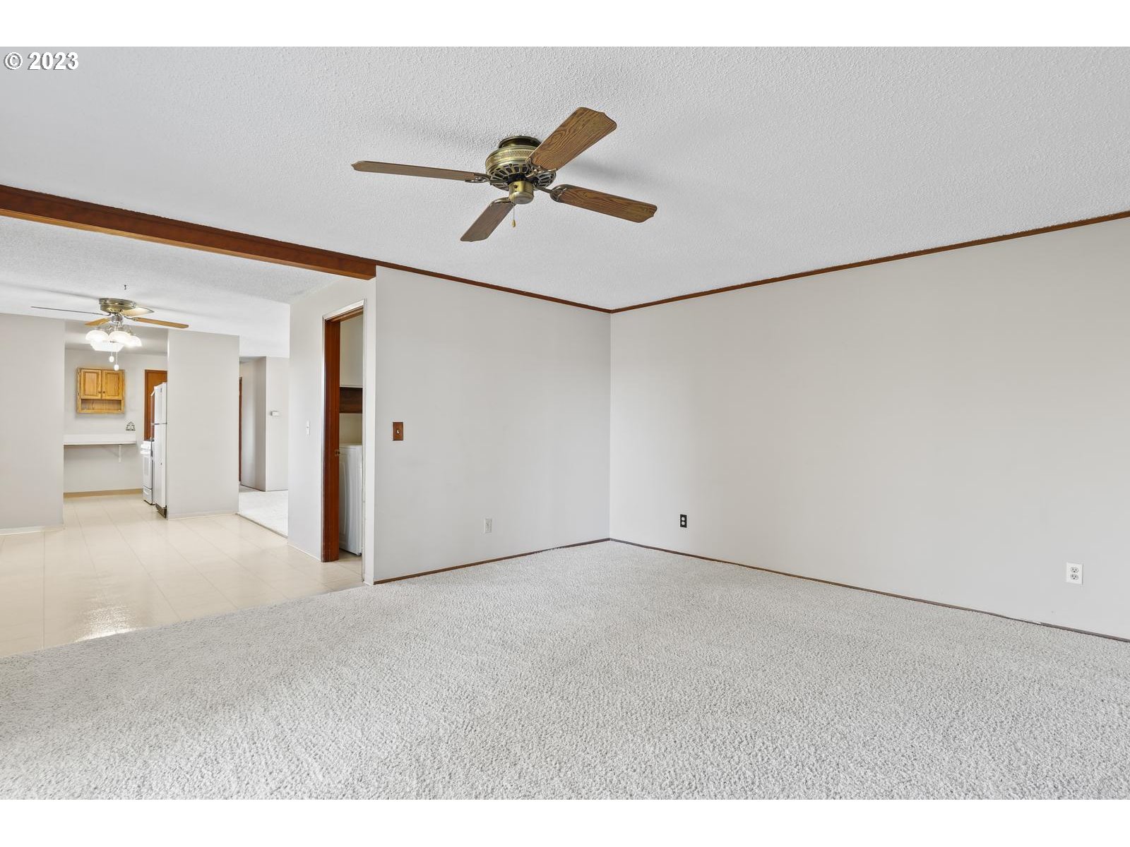23921 Southeast Oak Street Gresham, OR 97030 - Photo 39 of 46 a view of a room with cabinet and a ceiling fan