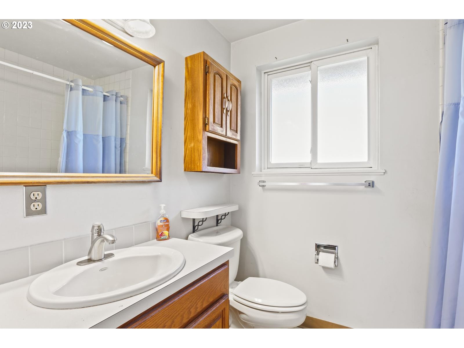 23921 Southeast Oak Street Gresham, OR 97030 - Photo 45 of 46 a bathroom with a sink and a mirror