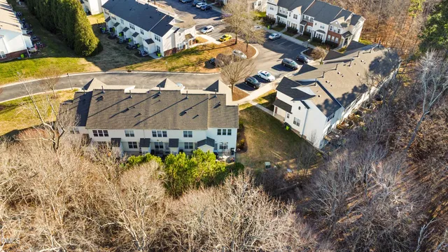 an aerial view of a house with swimming pool