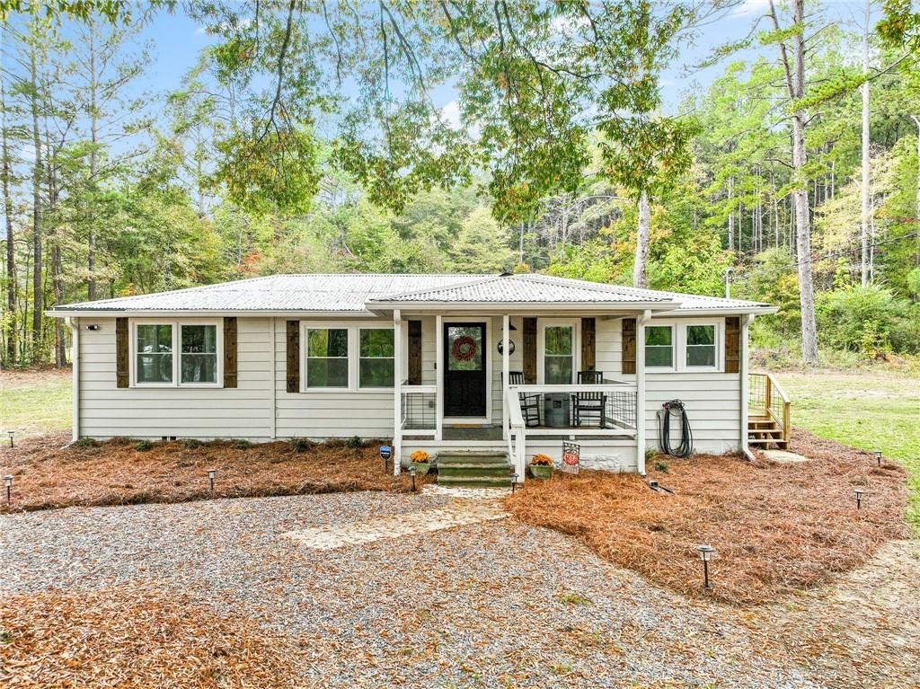 5203 Collard Valley Road Aragon, GA 30104 - Photo 1 of 1 a front view of a house with a yard